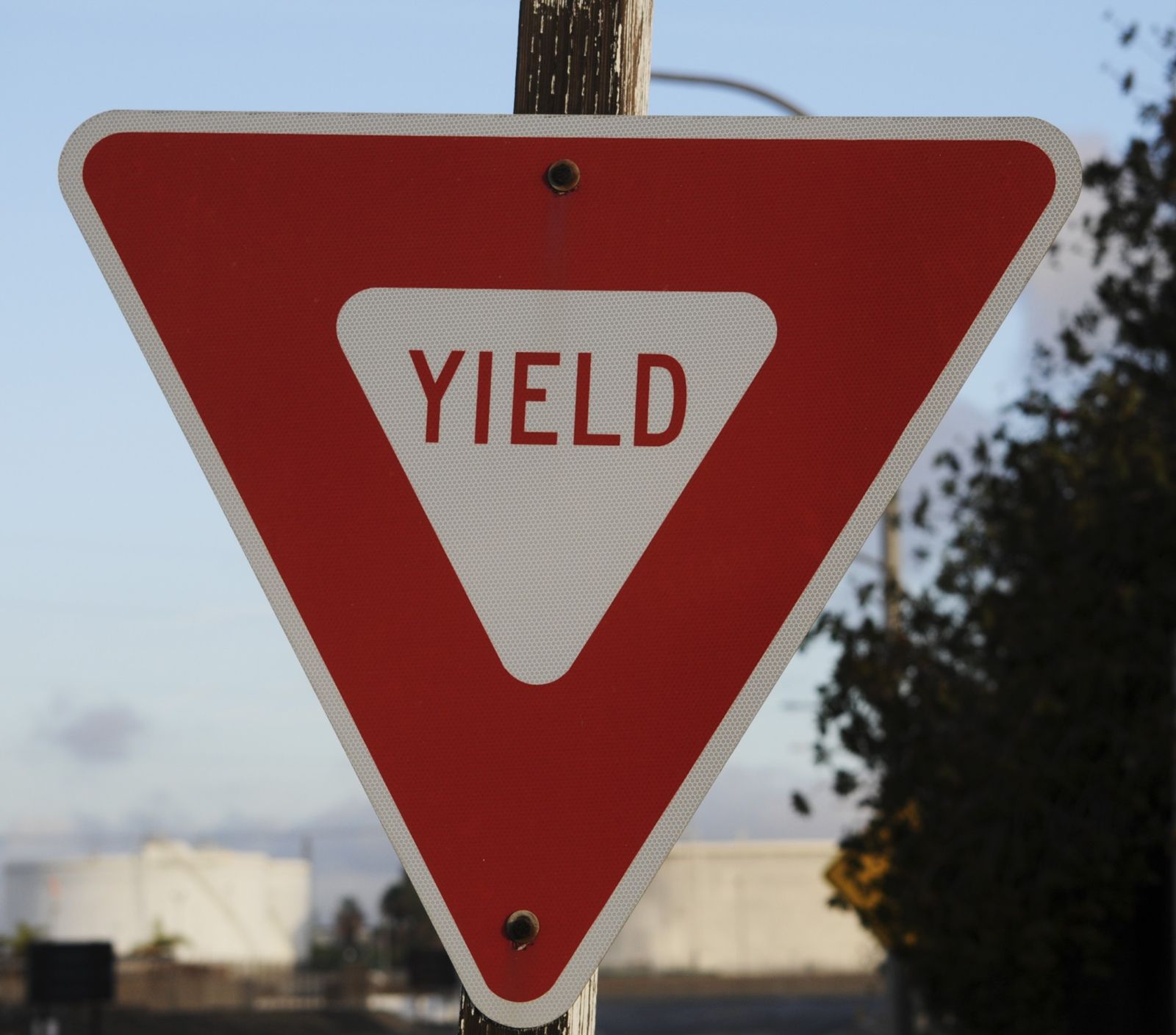 Needpix -- https://www.needpix.com/photo/1405044/yield-sign-warning-red-close-up-urban-industrial